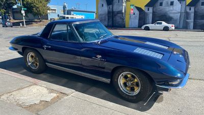 ’63 Corvette dark blue three quarters front right
